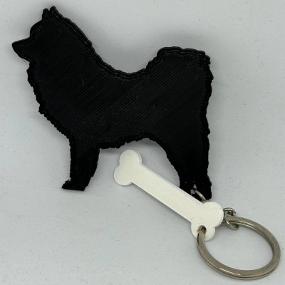 EVN-winkeltje: Sleutelhanger met 3D-geprinte Eurasier en botje